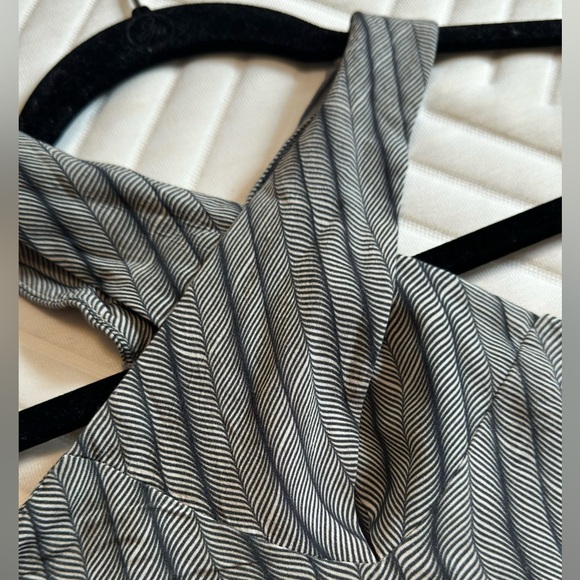 Elegant blouse features a unique design in navy blue tones. - Picture 4 of 4